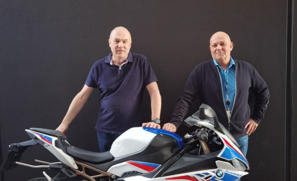 To Nord-lektorer med motorsykkel.