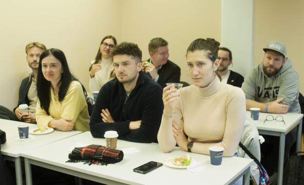 Ukrainian youth sitting at desks in a classroom during the Ukrainian Engineer meeting at Nord University