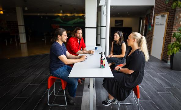 Students engaging in conversation.